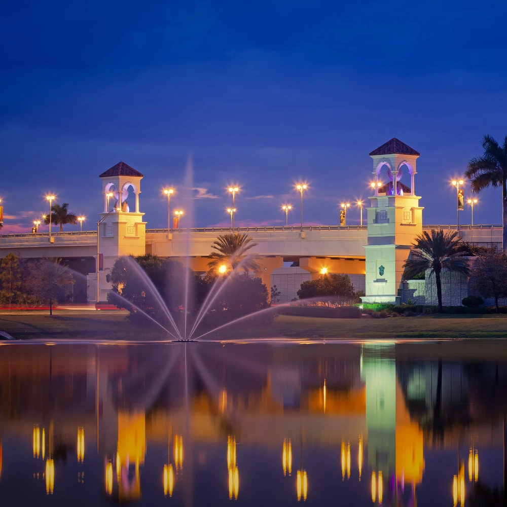 Fountain at PGA Boulevard Bridge in Palm Beach Gardens at night