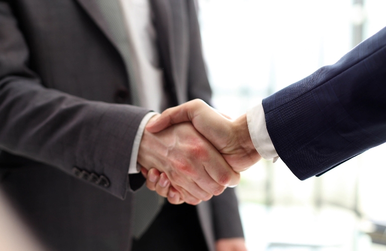 Two men shaking hands